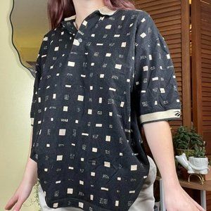 Vintage Black And Cream Reebok Golf polo shirt